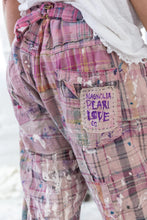Load image into Gallery viewer, Long pink madras plaid shorts up close back view with signature patch
