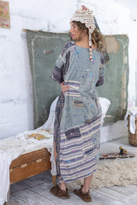 A symmetrical patchwork cover up dress full back view 