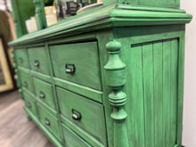 Load image into Gallery viewer, Boston Fern medium green with black finish side corner of hutch
