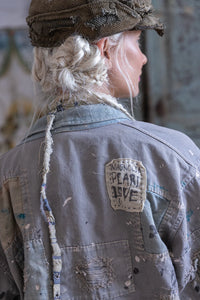 Denim patchwork jacket with signature patch back shoulder view 