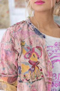 Embroidered lamb on front of jacket close view 