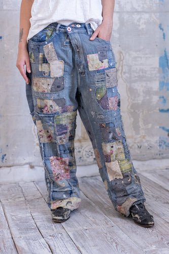 Very baggy jeans with a lot of patches Front view 