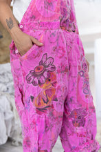 Load image into Gallery viewer, Duck and flower embroidered on pink overalls up close
