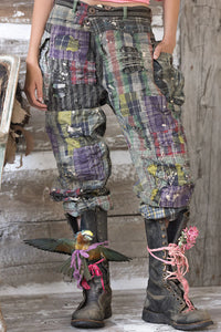 Up close view of plaid pants and boots