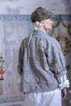 Load image into Gallery viewer, Patchwork denim jacket with patches back view 
