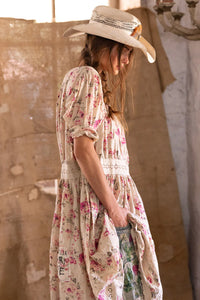 Side view girl in dress and hat