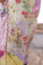 Load image into Gallery viewer, very close view of patches and embroidered flowers on pant leg ￼
