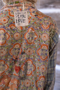 Up close view of back shirt with Magnolia Pearl patch